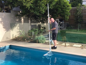 Christopher cleaning the pool in Brisbane