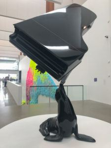 Seal sculpture balancing a piano at Brisbane Art Gallery
